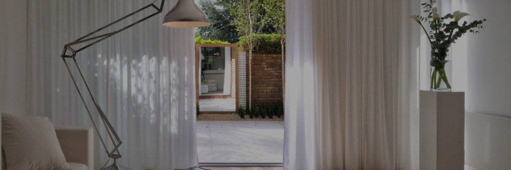 white sheer curtains in a living room