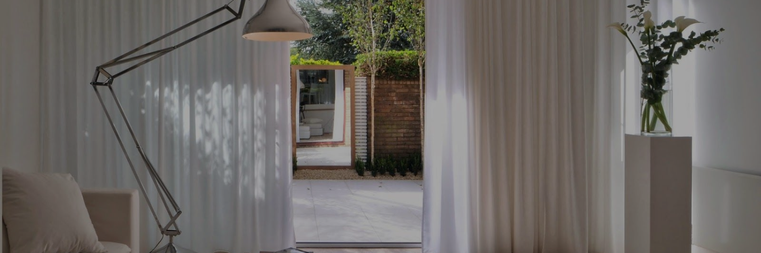 white sheer curtains in a living room
