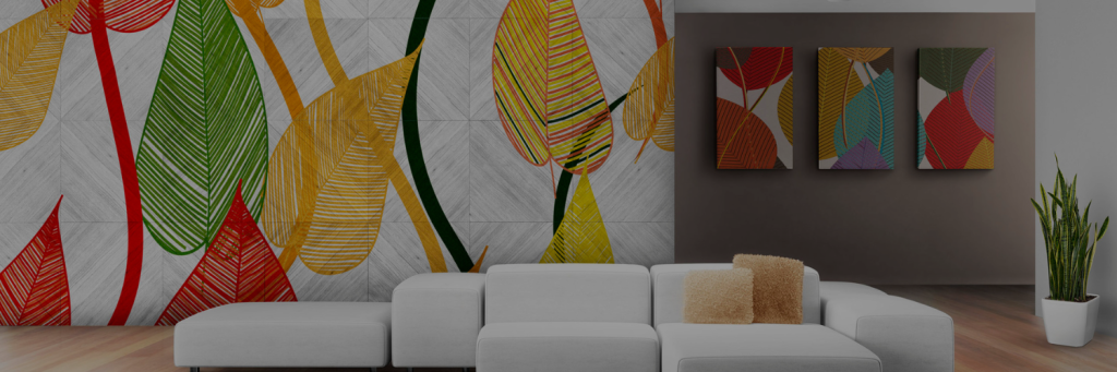 Modern living room featuring a white sofa, vibrant leaf-patterned wall art, and colorful abstract paintings. A green plant adds freshness.